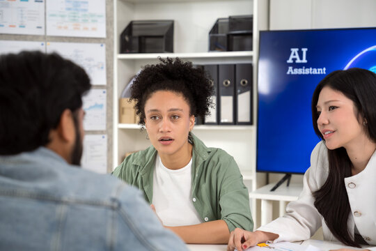 Business team discussing strategy during a meeting with AI assistant technology.
