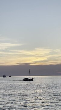 Sunset over the Aegean Sea at Little Venice in Mykonos, Greece