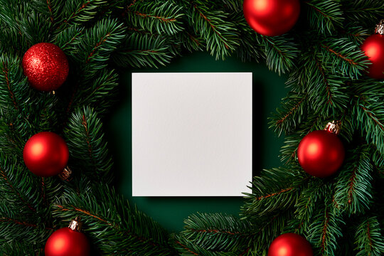 Overhead View of Blank Square Paper in Coniferous Christmas Wreath