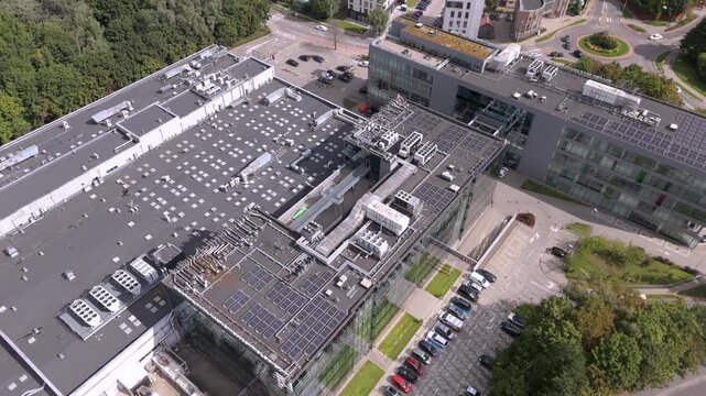 Aerial View of Data Center with Industrial HVAC and Solar Panels for Sustainable Tech Infrastructure