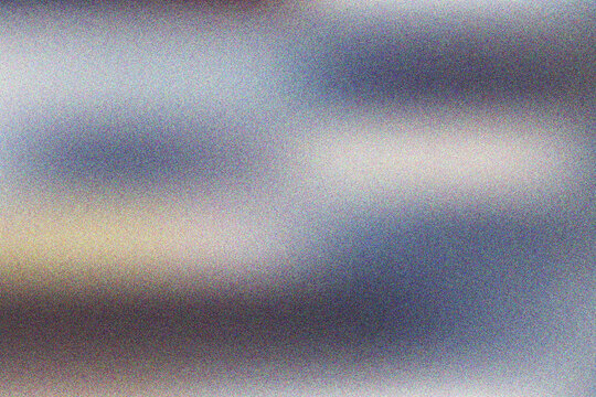 Soft grainy texture with gentle light transitions in neutral gray and muted cool blue tones