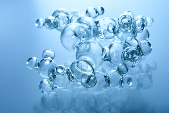 Glass molecular structure representing scientific research and biotechnology