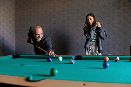 Pool game with daughter