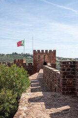 View of the castle walls in the ancient town of Silves in the Algarve, Portugal © smartin69