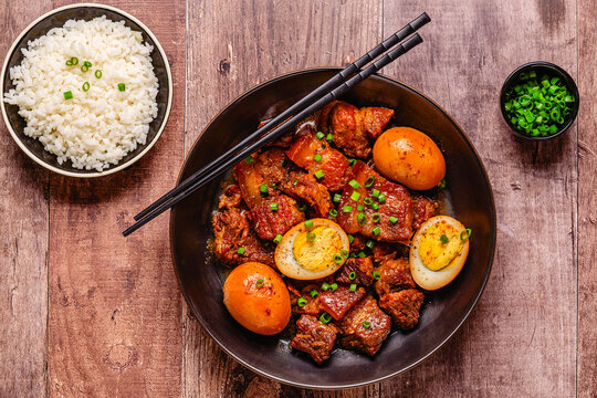 Braised pork belly and eggs. Traditional Southeast Asian cuisine