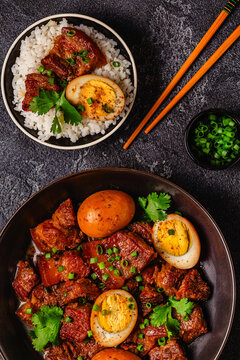 Braised pork belly and eggs. Traditional Southeast Asian cuisine