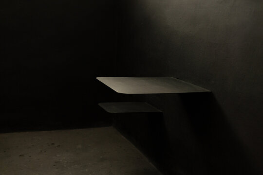 Vandal-proof table and chair in a solitary prison cell; a penal prison for political prisoners on Oreshek Island, Russia.