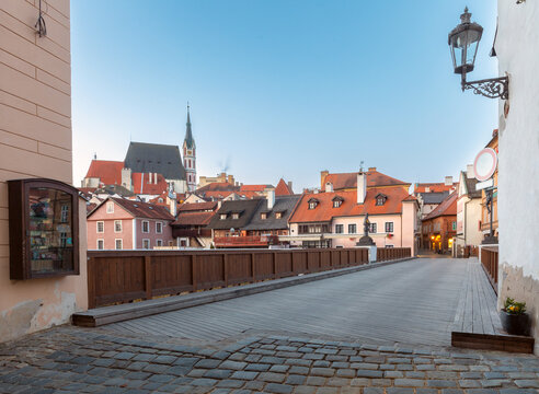 Historic Wooden Bridge and Old Town Architecture in Cesky Krumlov, Czech Republic