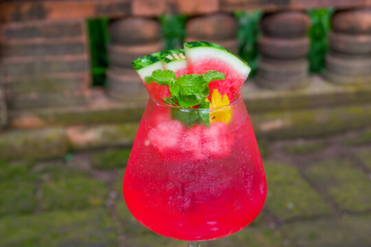 Watermelon Mojito on table, lemonade or cocktail with mint or Caipirinha,fruits beverage,refreshing summer drink recipe,menu for restaurant,selective focus.