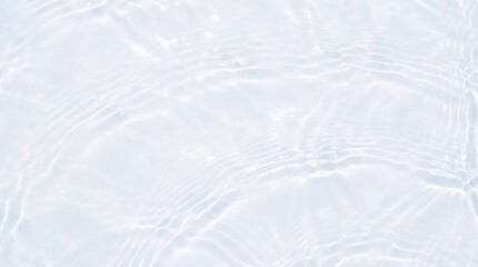 Obraz premium Clear Ripples on Calm Surface: Gentle, luminous ripples dance across a serene, pure water surface, reflecting subtle light patterns and evoking a sense of tranquility and refreshment.