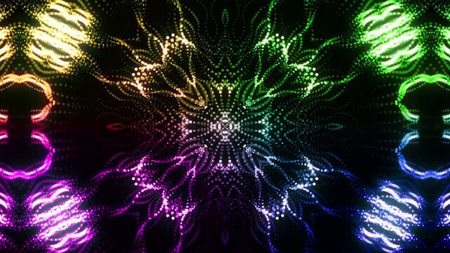 Radiant rainbow mandala formed from glowing dotted particles, creating a hypnotic psychedelic kaleidoscope animation on black.