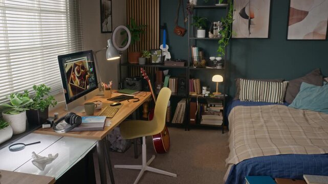 Computer monitor displaying photo editing software zooming out to reveal creative home office workspace. Clip is ideal for marketing remote work, freelance design, or creative lifestyle content