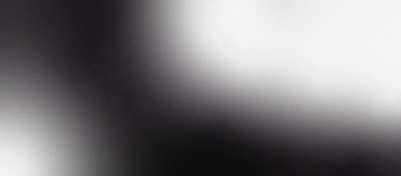 Abstract grainy texture with soft light and dark gradient