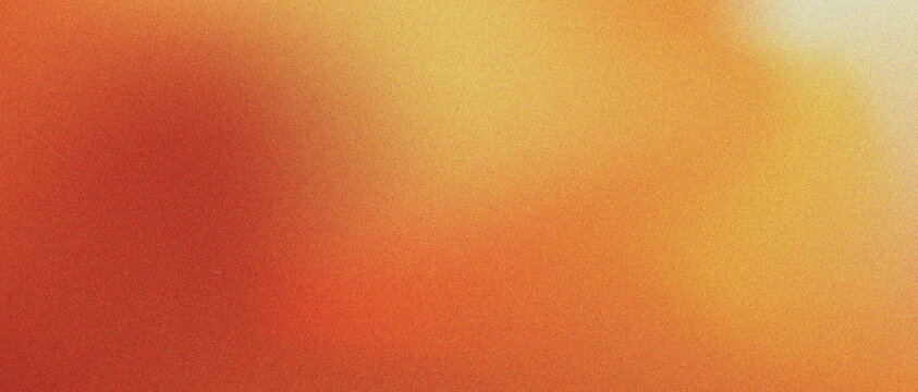 Abstract grainy gradient background in warm orange and yellow tones