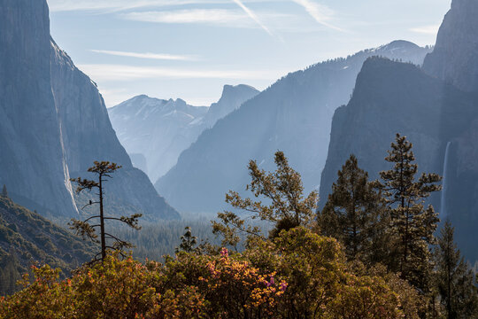 Beautiful scenic view of Yosemite Valley with El Capitan and Half Dome at sunrise