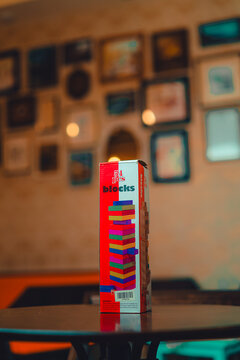 Wooden tumbling tower game box in a cafe