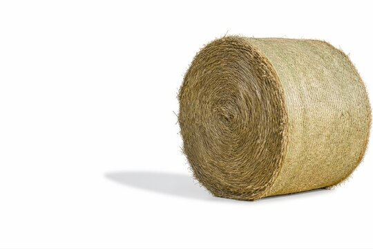 Hay bale isolated on white with soft shadow and farm texture