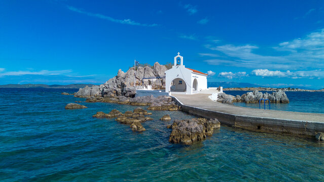 Aerial Drone View of Agios Isidoros Chapel on a Rocky Islet in Chios Greece