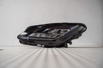 Modern LED car headlight isolated on white background © nayefhammouri