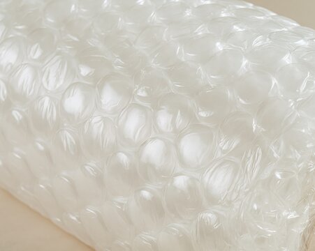 Close-up of bubble wrap packaging, showcasing clear plastic spheres.