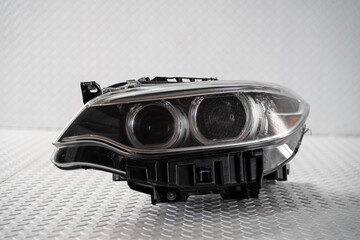 Modern LED car headlight isolated on white background © nayefhammouri