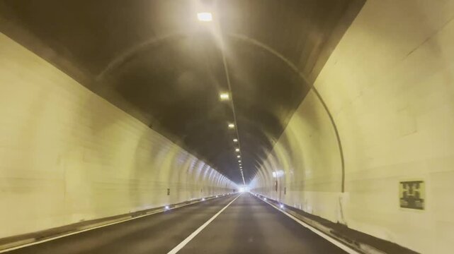 Driving through a road tunnel near Lake Garda, Italy