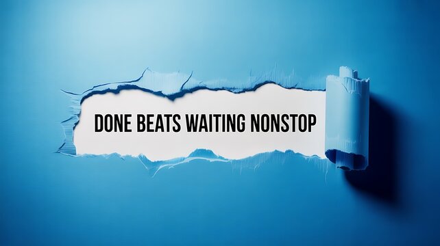 Blue ripped paper revealing text message stating done beats waiting nonstop