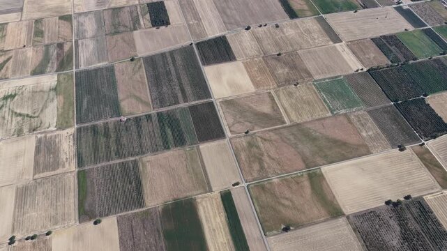Aerial view of a patchwork of agricultural fields in the rural landscape of Hombourg, Grand Est, France.