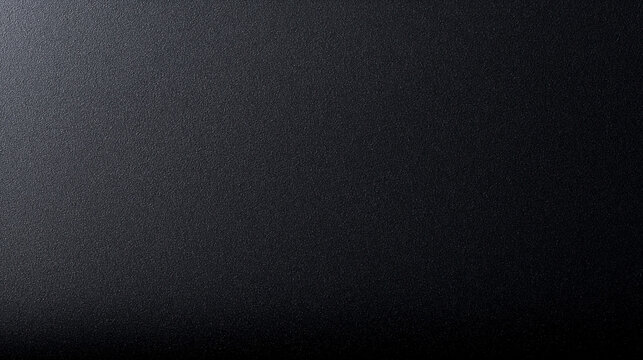 Dark Metallic Textured Surface with Light Gradient Background