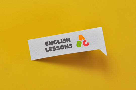 English Lessons and Language Learning Concept on Yellow Background