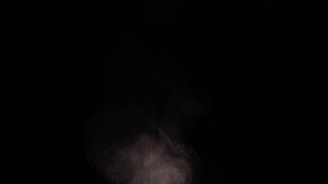 Thin Smoke Drifts Upward Against a Black Background, Creating a Moody Atmospheric Abstract Texture
