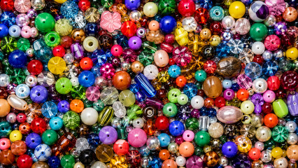 Fototapeta premium Colorful Assorted Craft Beads and Jewelry & Necklace Making Bead Background
