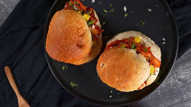 Top view of two delicious looking Mexican tortas filled with spit-roasted pork