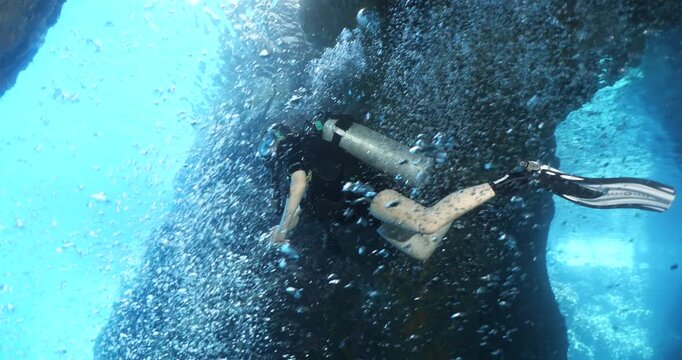 silhouette female scuba diver sun beam shine rays underwater lady woman diver relaxing blue ocean scenery of person