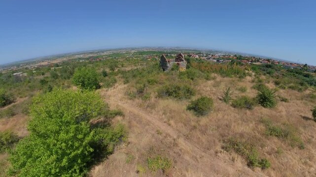 Fly around of an abandon chapel with a drone.