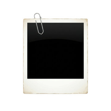 Vintage blank polaroid photo frame with a metal paper clip