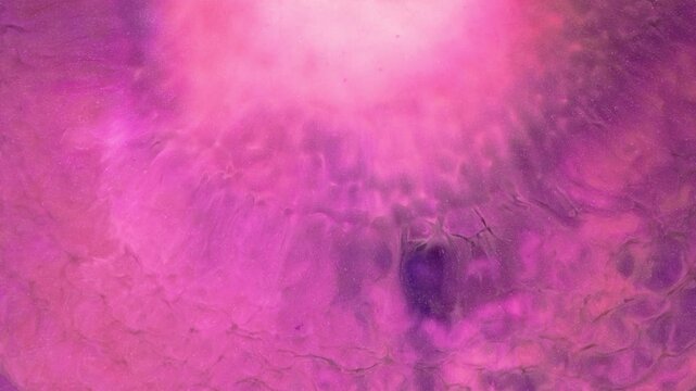 Mixing colorful alcohol inks in a close-up view of the art process
