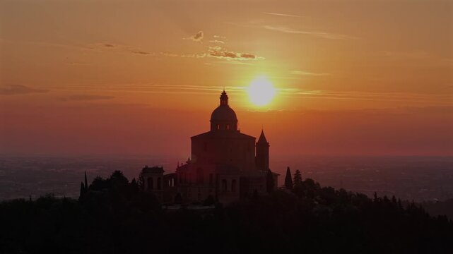 Cinematic drone video of the historic religious monument of San Luca in Emilia Romagna at dawn