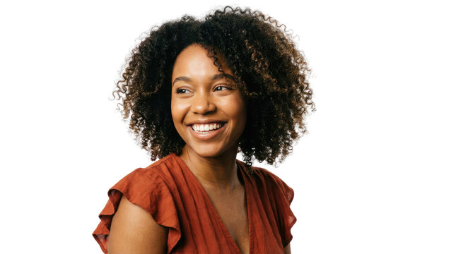 Smiling woman portrait with curly afro hair, casual brown blouse, isolated studio headshot for lifestyle advertising