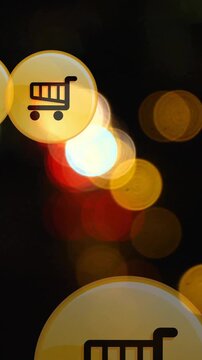 Animation of shopping cart icon in circles over blurred vehicles moving on street in city