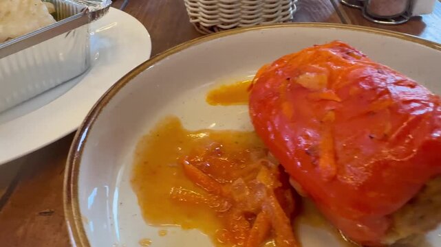 Fish with vegetables and stuffed peppers for lunch