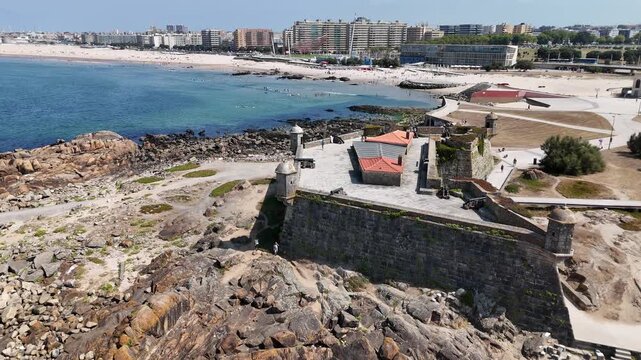Porto, Porto District, Portugal - 29 July 2026: Aerial view of Castelo do Queijo with stone walls and turrets overlooking the Atlantic Ocean coastline.
