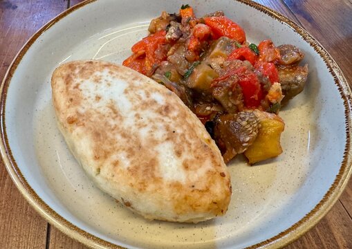 Meat patty with eggplant gravy