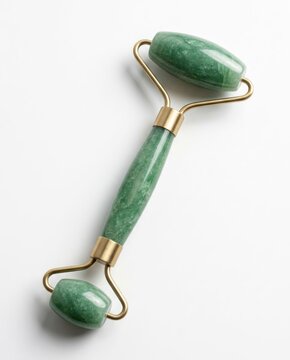 Green jade facial roller tool for skin care and beauty treatments