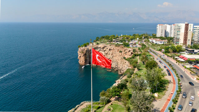 Turkish flag overlooking Duden Park coast in Antalya, Turkey