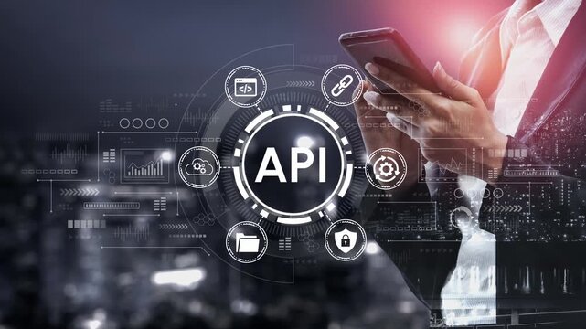 Business Professional Engaging with Mobile Device Surrounded by Technology Icons Representing API Software Development and Integration in Modern Digital Environment. Entropy.