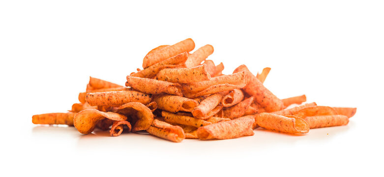 Spicy Rolled Corn Chips Stack Closeup On White Background For Snack Food Advertising