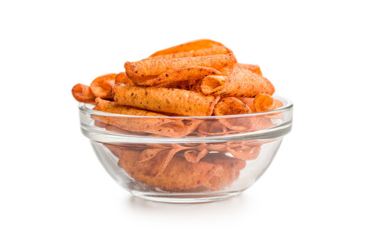 Spicy Rolled Corn Chips In Glass Bowl. Crunchy Seasoned Snack For Parties And Appetizers