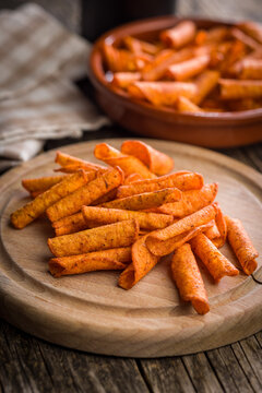 Spicy Rolled Tortilla Chips Piled in a Glass Bowl Crispy Snack Food Closeup