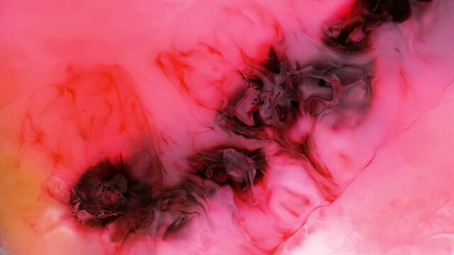 Mixing colored alcohol inks in close-up view for art creation